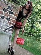 Sexy goth girl in nylon layers and monster heels