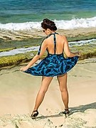 Sexy mature legs in ff nylons and heels at seaside